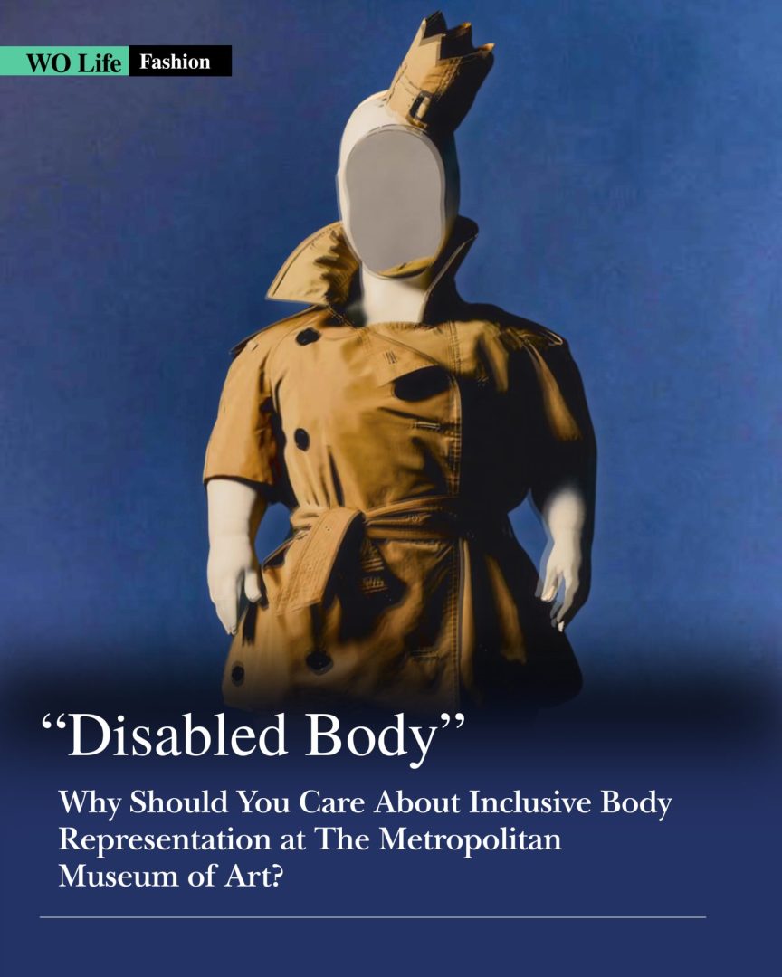 A fashion editorial image with a deep blue background featuring a mannequin wearing a tan trench coat with a crown-like headpiece. The top left shows "WO Life" in black on a green rectangle and "Fashion" in white. The bottom half displays the title "Disabled Body" in large white serif text, followed by the subtitle "Why Should You Care About Inclusive Body Representation at The Metropolitan Museum of Art?" in smaller white text. A thin white horizontal line sits near the bottom.